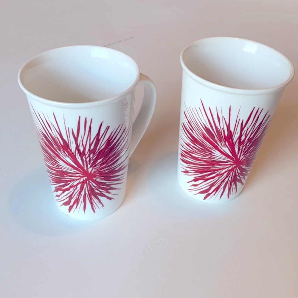 2 Star Bucks Coffee Mugs.  Star Burst Pattern. 12 oz.